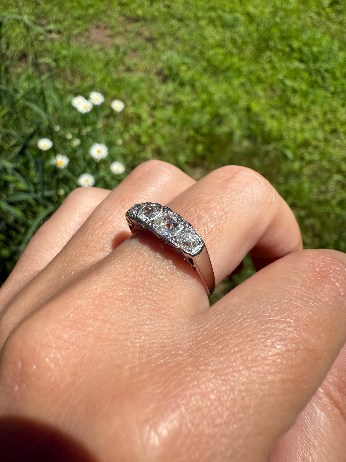 Antique 1.25 Carat Eye Clean Four Stone Old Mine Cut Diamond 18k White Gold French Band