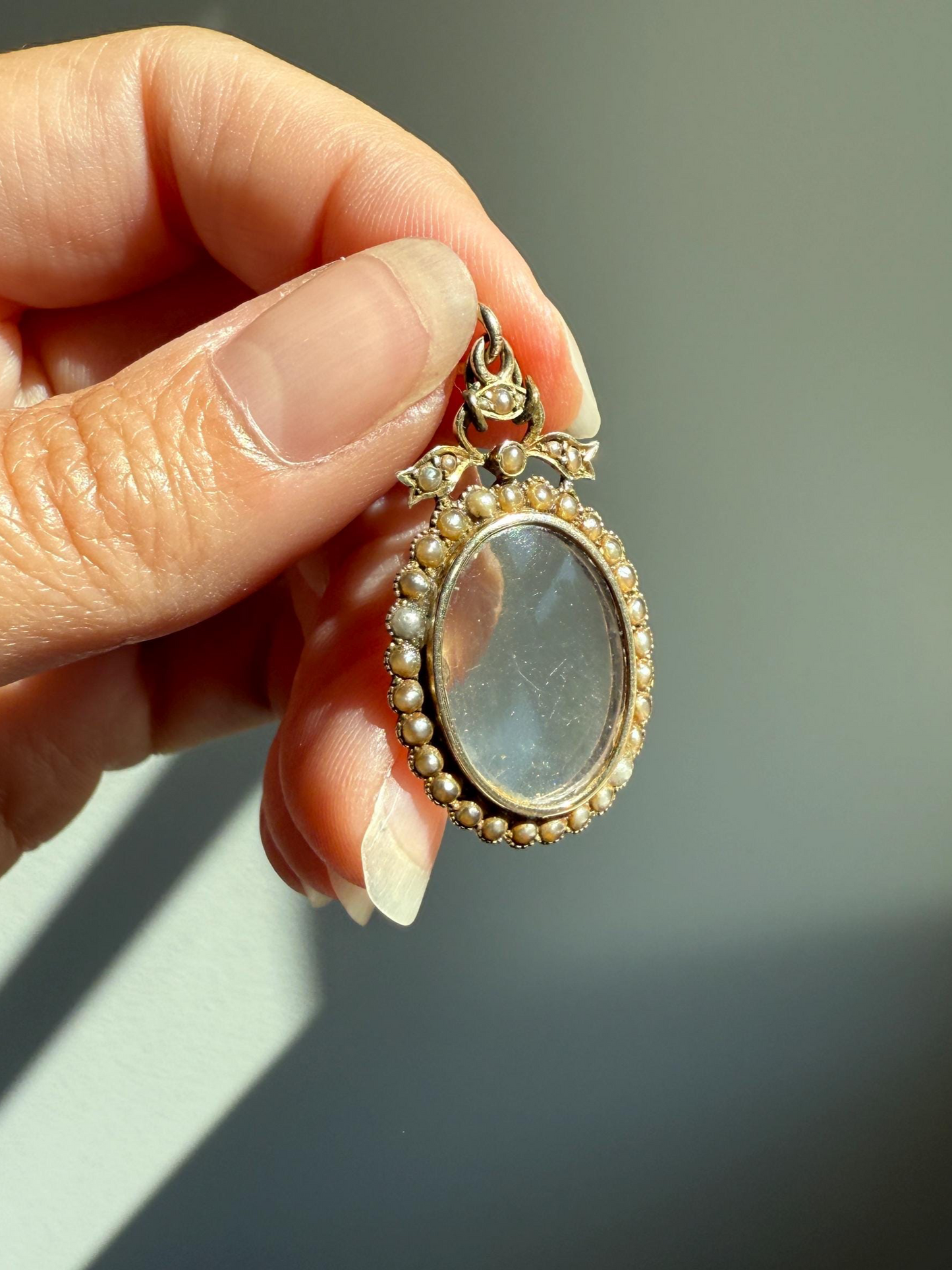 BOW Ribbon Crowned Oval Antique LOCKET Pendant VICTORIAN Era with Pearl Halo & Opening Back 9k Gold
