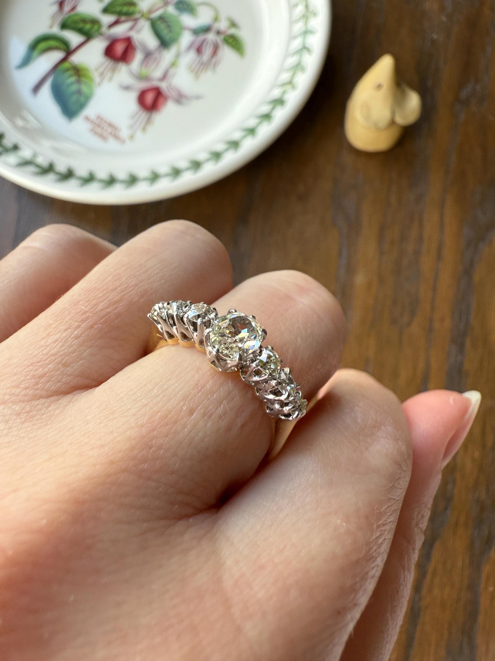 Antique Edwardian Art Deco 1.3 Carat Seven Stone Old Mine Cut Diamond Band Eye Clean Oval Center 18k Gold Platinum Prongs Tall Stacker