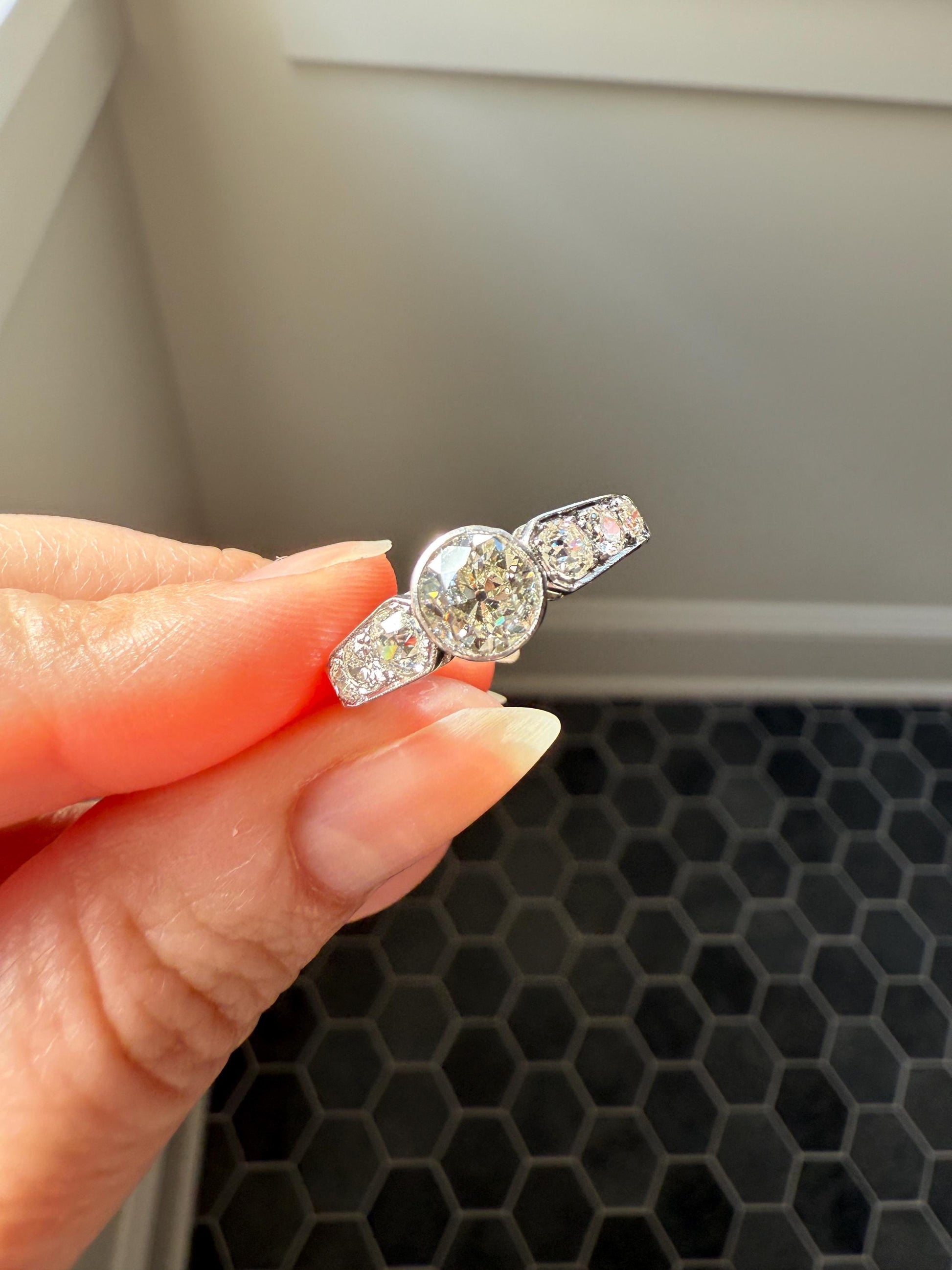 Art Deco Antique Bezel Set Eye Clean 1.85 Carat Tdw Old Mine Cut Diamond Seven Stone Solitaire w/ Accents 18k White Gold & Platinum