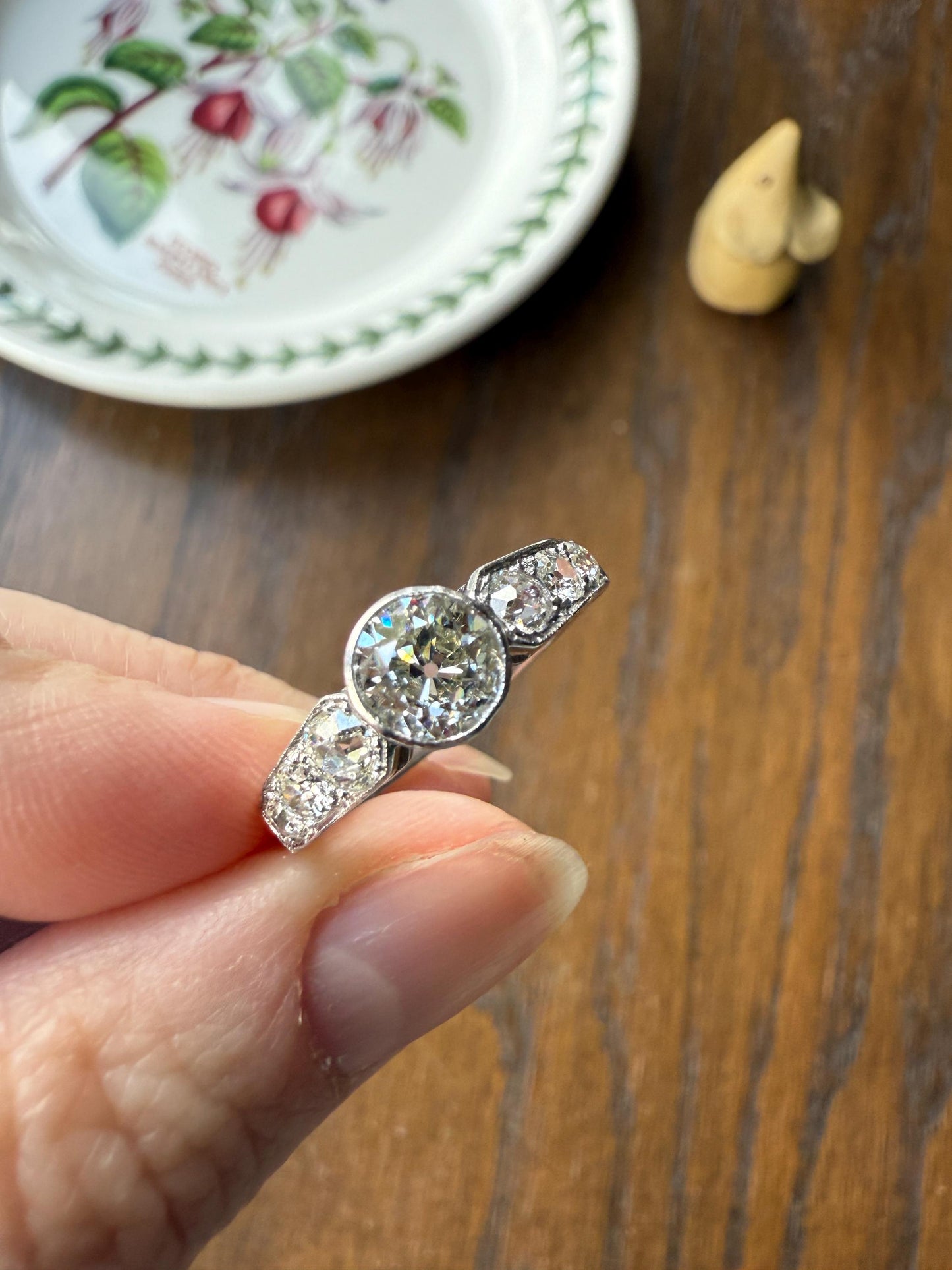 Art Deco Antique Bezel Set Eye Clean 1.85 Carat Tdw Old Mine Cut Diamond Seven Stone Solitaire w/ Accents 18k White Gold & Platinum