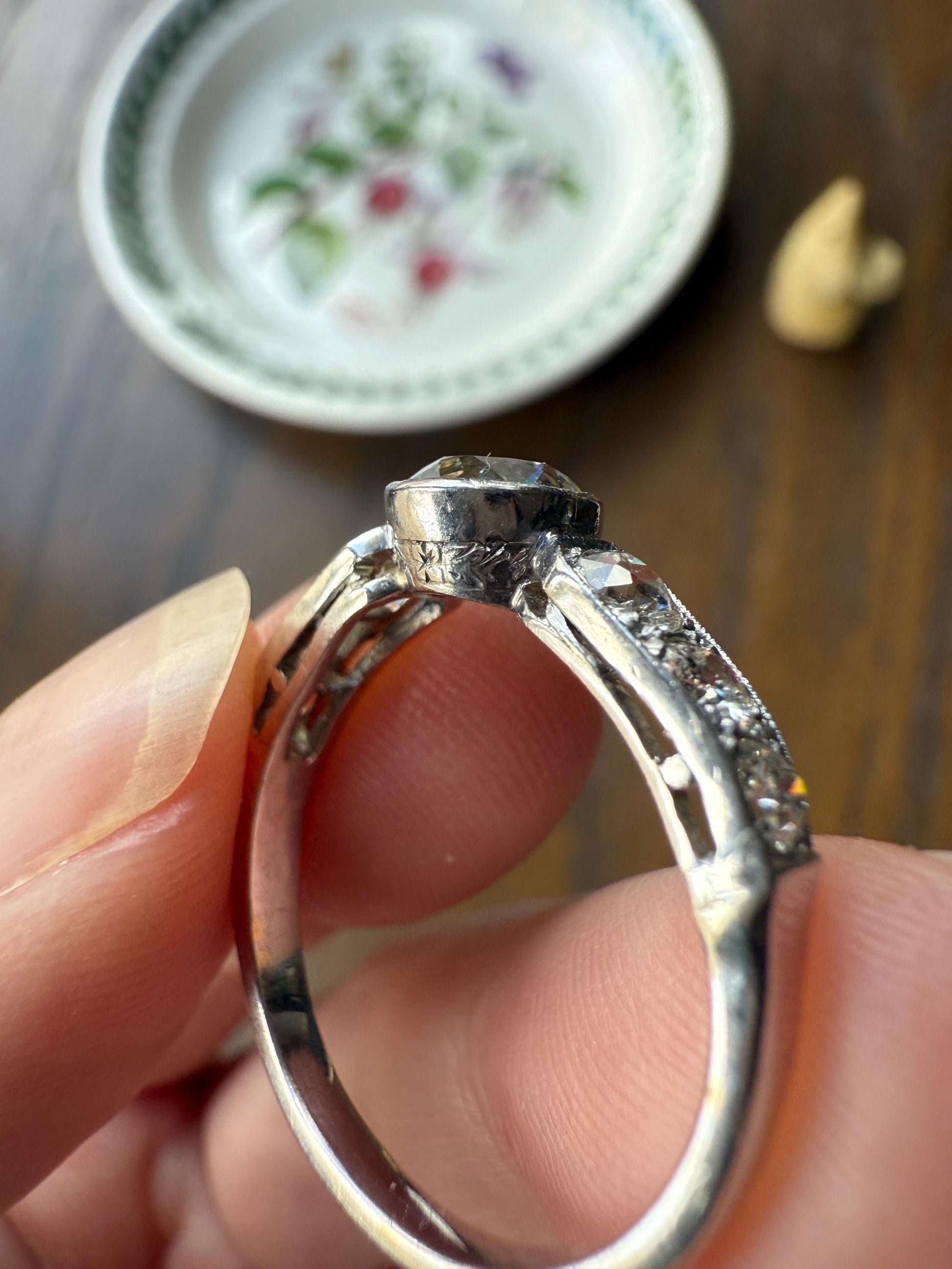 Art Deco Antique Bezel Set Eye Clean 1.85 Carat Tdw Old Mine Cut Diamond Seven Stone Solitaire w/ Accents 18k White Gold & Platinum