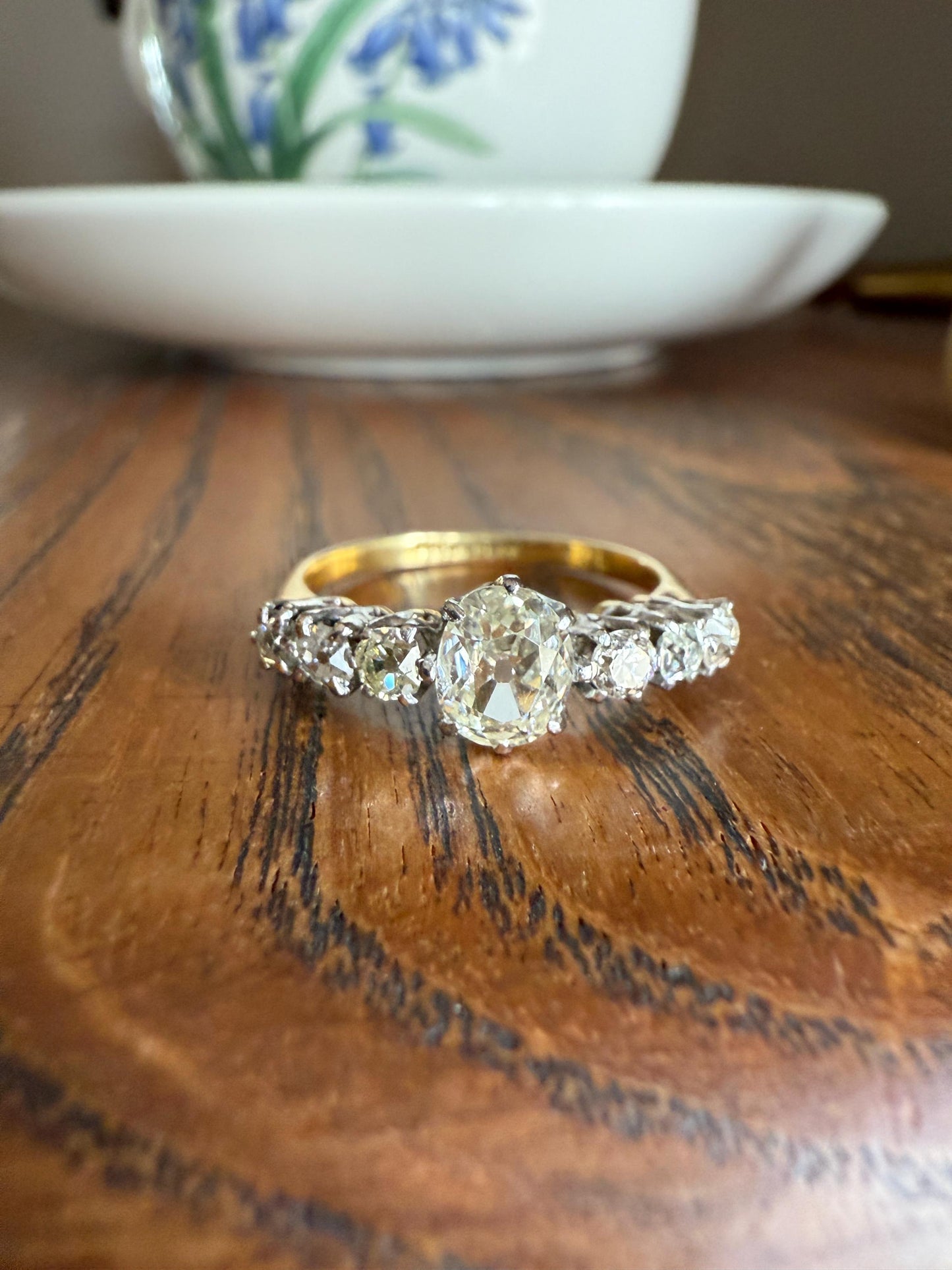 Antique Edwardian Art Deco 1.3 Carat Seven Stone Old Mine Cut Diamond Band Eye Clean Oval Center 18k Gold Platinum Prongs Tall Stacker