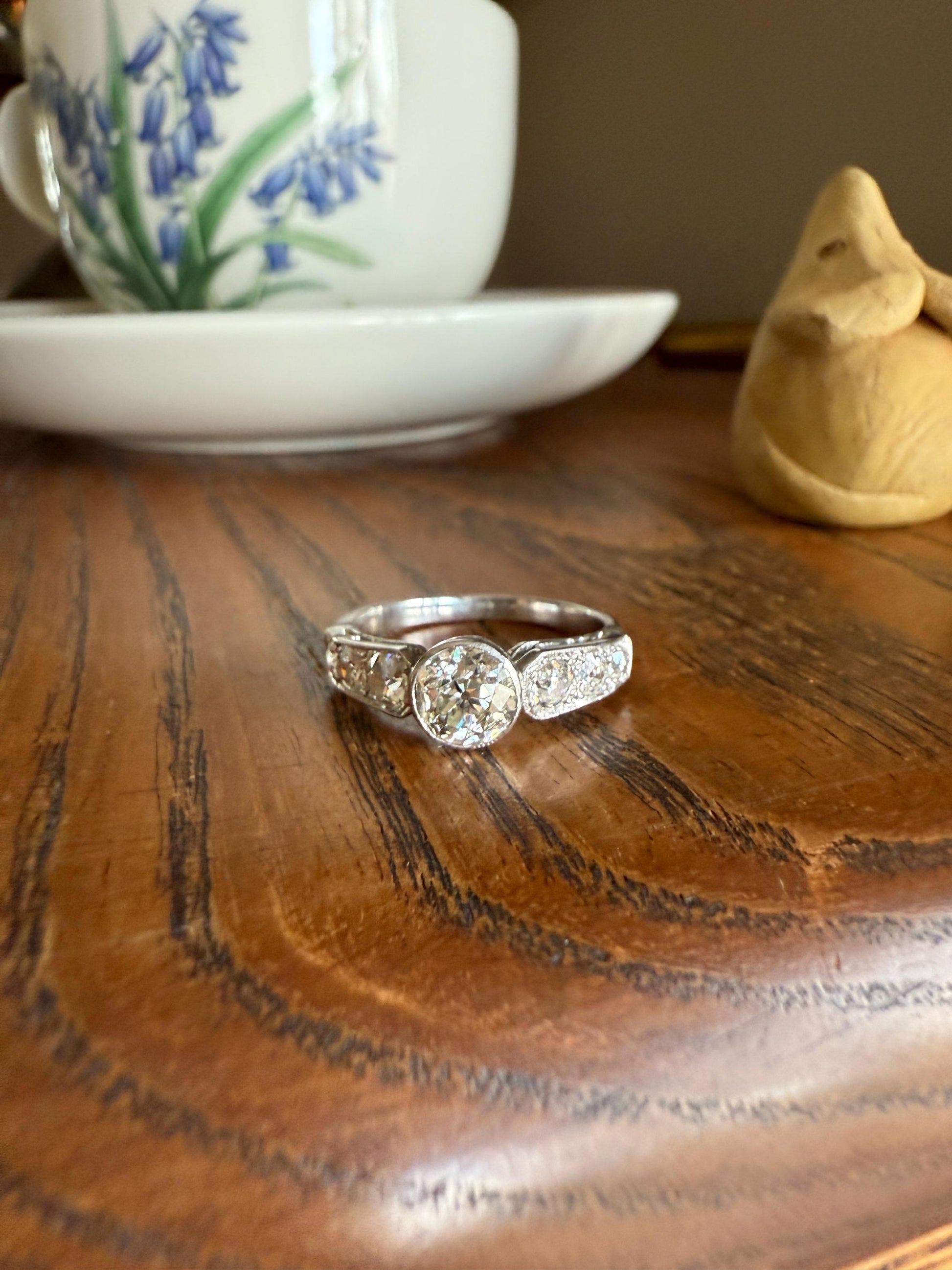 Art Deco Antique Bezel Set Eye Clean 1.85 Carat Tdw Old Mine Cut Diamond Seven Stone Solitaire w/ Accents 18k White Gold & Platinum