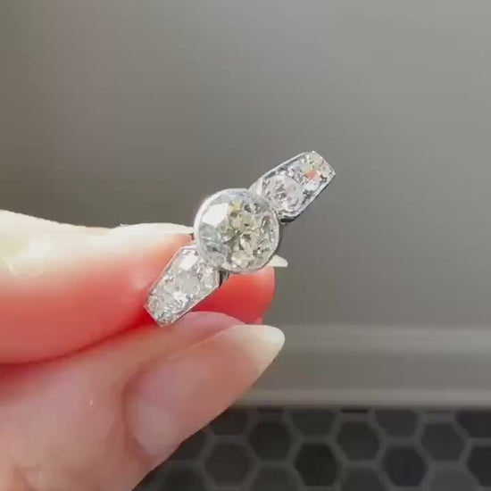 Art Deco Antique Bezel Set Eye Clean 1.85 Carat Tdw Old Mine Cut Diamond Seven Stone Solitaire w/ Accents 18k White Gold & Platinum