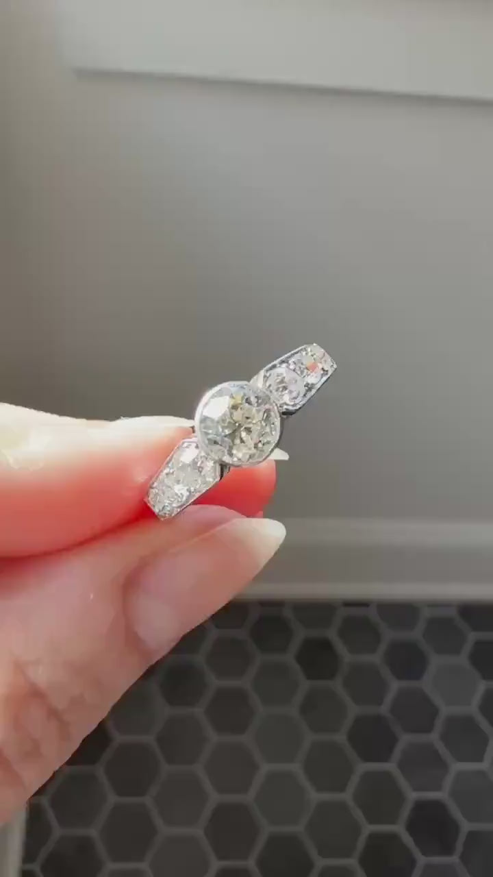 Art Deco Antique Bezel Set Eye Clean 1.85 Carat Tdw Old Mine Cut Diamond Seven Stone Solitaire w/ Accents 18k White Gold & Platinum